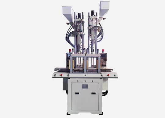 High speed vertical injection molding machine